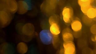 金黄色镜头光斑粒子装饰视频素材