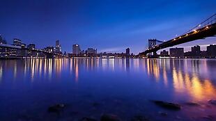 夜晚海边城市浪漫风景延时摄影素材